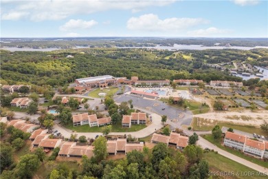 Welcome to this spacious yet cozy, 3 Bedroom, 2 Bath, end unit on Seasons Ridge At Four Seasons in Missouri - for sale on GolfHomes.com, golf home, golf lot