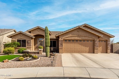This gorgeous home welcomes you with an extended 2.5 car garage on Sunland Springs Golf Course  in Arizona - for sale on GolfHomes.com, golf home, golf lot