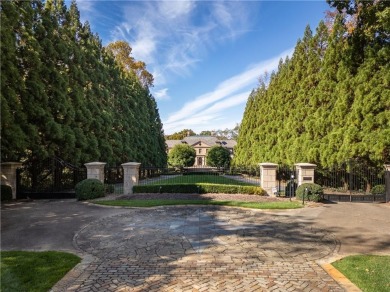 *Evergreen* Estate  is set on a ridge-top lot above the city in on Bobby Jones Golf Club in Georgia - for sale on GolfHomes.com, golf home, golf lot