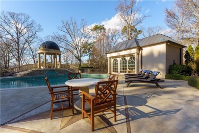 *Evergreen* Estate  is set on a ridge-top lot above the city in on Bobby Jones Golf Club in Georgia - for sale on GolfHomes.com, golf home, golf lot