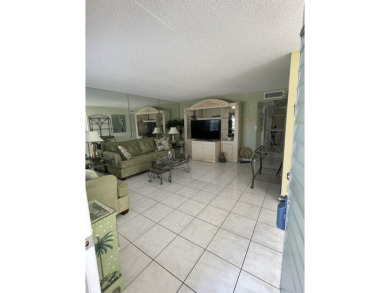 BIG PRICE ADJUSTMENT!  Well-maintained 2 bed/2 bath condo in on Kings Point Golf -Flanders Way in Florida - for sale on GolfHomes.com, golf home, golf lot