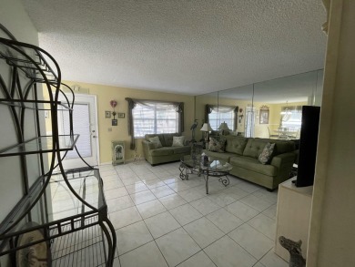 BIG PRICE ADJUSTMENT!  Well-maintained 2 bed/2 bath condo in on Kings Point Golf -Flanders Way in Florida - for sale on GolfHomes.com, golf home, golf lot