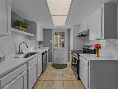 This townhouse has three sizable bedrooms each with private on Prairie Lakes Golf Club in Texas - for sale on GolfHomes.com, golf home, golf lot