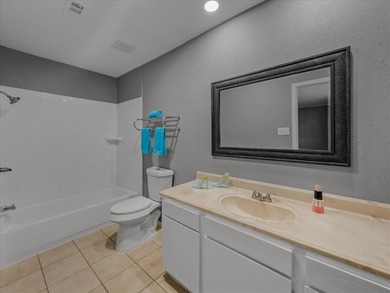 This townhouse has three sizable bedrooms each with private on Prairie Lakes Golf Club in Texas - for sale on GolfHomes.com, golf home, golf lot