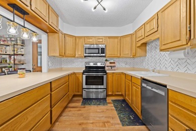 Discover this delightful 3-bedroom, 2-bath home nestled in the on Emerald Bay Club in Texas - for sale on GolfHomes.com, golf home, golf lot