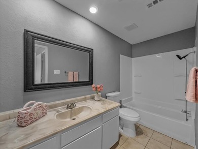 This townhouse has three sizable bedrooms each with private on Prairie Lakes Golf Club in Texas - for sale on GolfHomes.com, golf home, golf lot