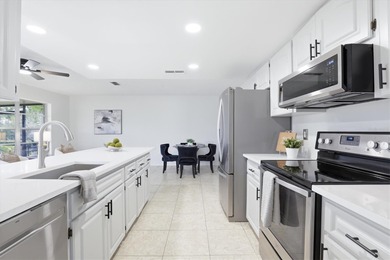 Welcome to this beautifully updated 2-bedroom, 2-bathroom on Highland Lakes Executive Golf Course in Florida - for sale on GolfHomes.com, golf home, golf lot