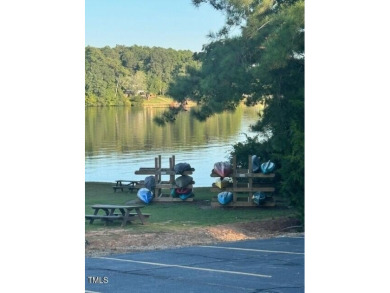 Bring your builder! This lot in beautiful Lake Royale is ready on River Golf and County Club at Lake Royale in North Carolina - for sale on GolfHomes.com, golf home, golf lot