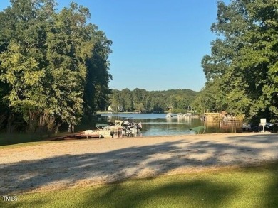 Bring your builder! This lot in beautiful Lake Royale is ready on River Golf and County Club at Lake Royale in North Carolina - for sale on GolfHomes.com, golf home, golf lot