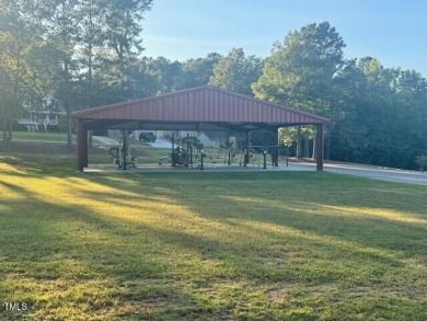 Bring your builder! This lot in beautiful Lake Royale is ready on River Golf and County Club at Lake Royale in North Carolina - for sale on GolfHomes.com, golf home, golf lot