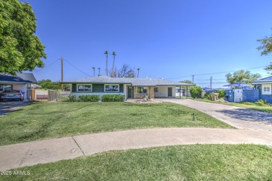 Beautifully remodeled home tucked away on a cul de sac lot in a on Encanto 18 Golf Course in Arizona - for sale on GolfHomes.com, golf home, golf lot