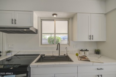 Beautifully remodeled home tucked away on a cul de sac lot in a on Encanto 18 Golf Course in Arizona - for sale on GolfHomes.com, golf home, golf lot