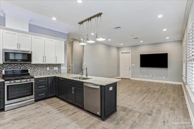 Welcome to this beautifully maintained custom home, thoughtfully on Pensacola Country Club in Florida - for sale on GolfHomes.com, golf home, golf lot