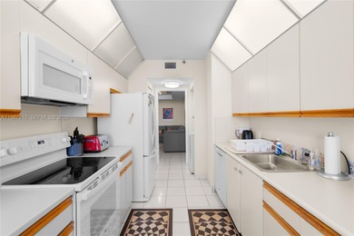 Spacious and inviting 2-bedroom + den, 2-bath residence in on Turnberry Isle Resort and Club in Florida - for sale on GolfHomes.com, golf home, golf lot