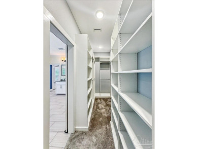 Welcome to this beautifully maintained custom home, thoughtfully on Pensacola Country Club in Florida - for sale on GolfHomes.com, golf home, golf lot