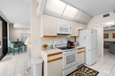 Spacious and inviting 2-bedroom + den, 2-bath residence in on Turnberry Isle Resort and Club in Florida - for sale on GolfHomes.com, golf home, golf lot