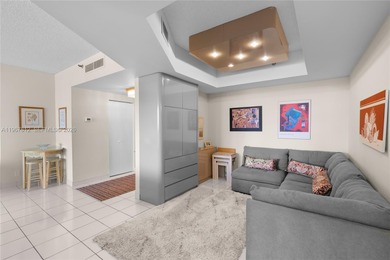 Spacious and inviting 2-bedroom + den, 2-bath residence in on Turnberry Isle Resort and Club in Florida - for sale on GolfHomes.com, golf home, golf lot