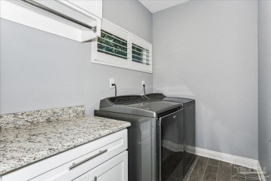 Welcome to this beautifully maintained custom home, thoughtfully on Pensacola Country Club in Florida - for sale on GolfHomes.com, golf home, golf lot