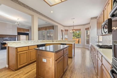 Welcome to this spacious two-story home offering 5 bedrooms, 4 on Hackberry Creek Country Club in Texas - for sale on GolfHomes.com, golf home, golf lot