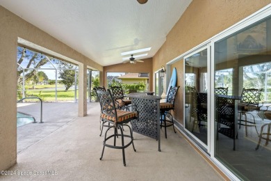 Nested amidst rare 0.96 acres on a serene lake, this 3-bed/ on Baytree National Golf Links in Florida - for sale on GolfHomes.com, golf home, golf lot