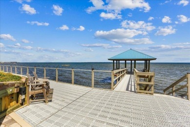 Welcome to this beautifully maintained custom home, thoughtfully on Pensacola Country Club in Florida - for sale on GolfHomes.com, golf home, golf lot