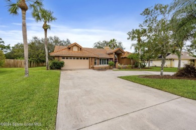 Nested amidst rare 0.96 acres on a serene lake, this 3-bed/ on Baytree National Golf Links in Florida - for sale on GolfHomes.com, golf home, golf lot