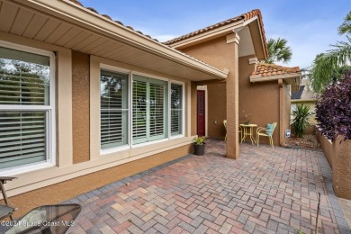 Nested amidst rare 0.96 acres on a serene lake, this 3-bed/ on Baytree National Golf Links in Florida - for sale on GolfHomes.com, golf home, golf lot