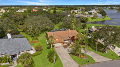 Nested amidst rare 0.96 acres on a serene lake, this 3-bed/ on Baytree National Golf Links in Florida - for sale on GolfHomes.com, golf home, golf lot