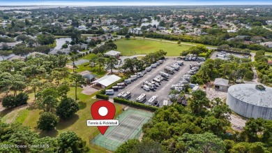 Nested amidst rare 0.96 acres on a serene lake, this 3-bed/ on Baytree National Golf Links in Florida - for sale on GolfHomes.com, golf home, golf lot