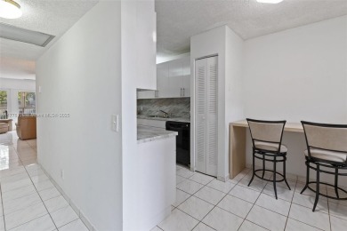 Turn-Key 2/2 Condo in Century Village - where life is anything on Flamingo Lakes Country Club in Florida - for sale on GolfHomes.com, golf home, golf lot
