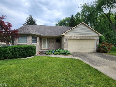 Welcome to our Waterford site condo listing. Enjoy the comfort on White Lake Oaks Golf Course in Michigan - for sale on GolfHomes.com, golf home, golf lot