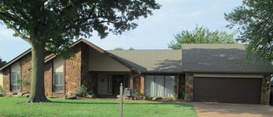 This stunning one-level contemporary home offers 2,173 square on The Greens Country Club in Oklahoma - for sale on GolfHomes.com, golf home, golf lot