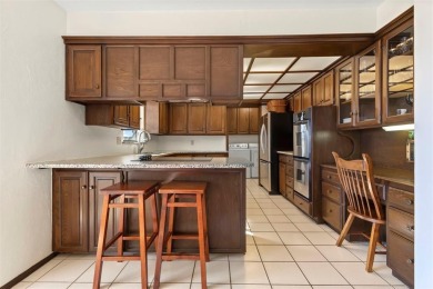This stunning one-level contemporary home offers 2,173 square on The Greens Country Club in Oklahoma - for sale on GolfHomes.com, golf home, golf lot