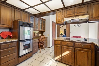 This stunning one-level contemporary home offers 2,173 square on The Greens Country Club in Oklahoma - for sale on GolfHomes.com, golf home, golf lot