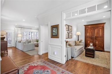 Tucked beneath a canopy of mature hardwoods and overlooking the on Moores Mill Golf Club in Alabama - for sale on GolfHomes.com, golf home, golf lot