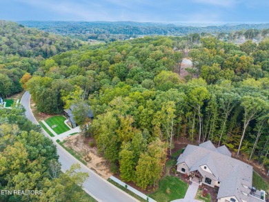 Nestled within an exclusive golf community, this stunning lot on Tennessee National Golf Club in Tennessee - for sale on GolfHomes.com, golf home, golf lot
