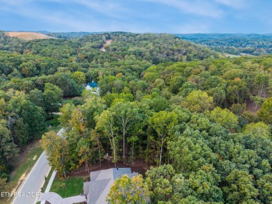Nestled within an exclusive golf community, this stunning lot on Tennessee National Golf Club in Tennessee - for sale on GolfHomes.com, golf home, golf lot