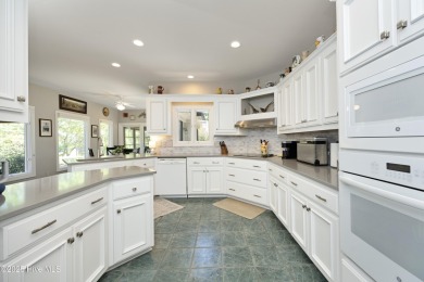 Lovely golf front home located in Pinewild that features mostly on Pinewild Country Club of Pinehurst in North Carolina - for sale on GolfHomes.com, golf home, golf lot