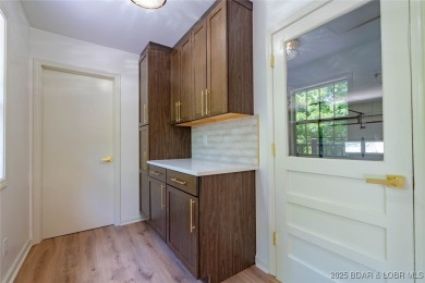 Completely reimagined with luxury in mind, this 4 bed, 3 bath on Sycamore Creek Golf Club in Missouri - for sale on GolfHomes.com, golf home, golf lot