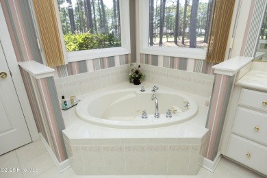 Lovely golf front home located in Pinewild that features mostly on Pinewild Country Club of Pinehurst in North Carolina - for sale on GolfHomes.com, golf home, golf lot