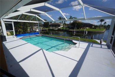 Welcome to Punta Gorda and Burnt Store Isles which is a water on Twin Isles Country Club in Florida - for sale on GolfHomes.com, golf home, golf lot