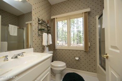 Lovely golf front home located in Pinewild that features mostly on Pinewild Country Club of Pinehurst in North Carolina - for sale on GolfHomes.com, golf home, golf lot