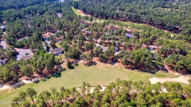 Lovely golf front home located in Pinewild that features mostly on Pinewild Country Club of Pinehurst in North Carolina - for sale on GolfHomes.com, golf home, golf lot