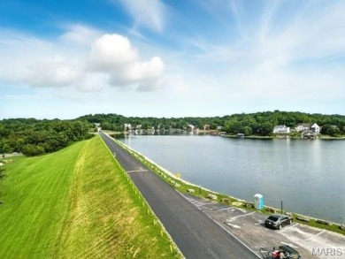 Lake Front Lot on Almost 1/2 Acre Lot on Small Private Lake on Raintree Country Club in Missouri - for sale on GolfHomes.com, golf home, golf lot