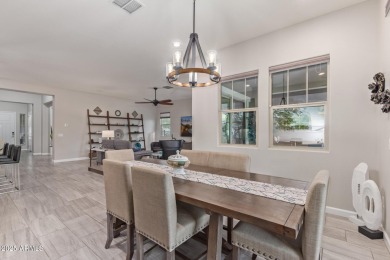 Discover this beautifully upgraded home in the highly on Verrado Golf Club - Victory in Arizona - for sale on GolfHomes.com, golf home, golf lot