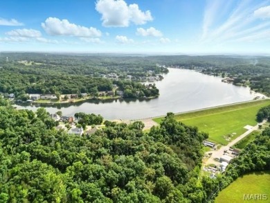 Lake Front Lot on Almost 1/2 Acre Lot on Small Private Lake on Raintree Country Club in Missouri - for sale on GolfHomes.com, golf home, golf lot