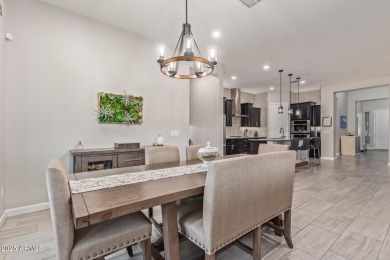 Discover this beautifully upgraded home in the highly on Verrado Golf Club - Victory in Arizona - for sale on GolfHomes.com, golf home, golf lot