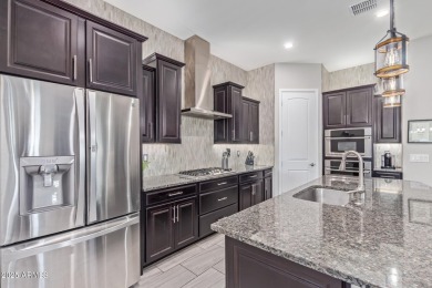 Discover this beautifully upgraded home in the highly on Verrado Golf Club - Victory in Arizona - for sale on GolfHomes.com, golf home, golf lot