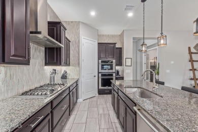 Discover this beautifully upgraded home in the highly on Verrado Golf Club - Victory in Arizona - for sale on GolfHomes.com, golf home, golf lot