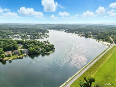 Lake Front Lot on Almost 1/2 Acre Lot on Small Private Lake on Raintree Country Club in Missouri - for sale on GolfHomes.com, golf home, golf lot